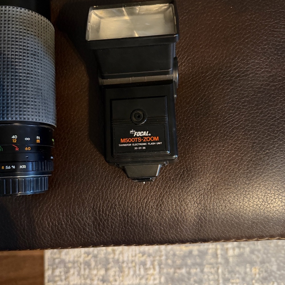 Pentax Silver Film Camera with Black Lens and Red Strap - Picture 3 of 5